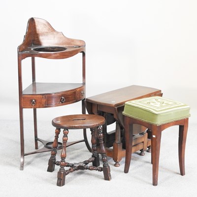 Lot 392 - A George III mahogany corner washstand, 102cm...
