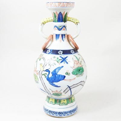 Lot 50 - A Chinese Wucai decorated porcelain vase,...