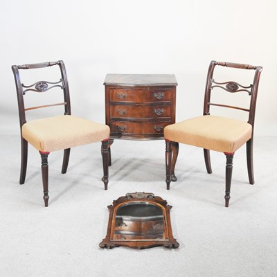 Lot 213 - An early 20th century bedside chest, together...