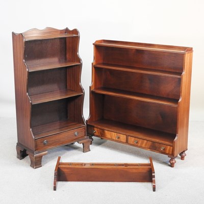 Lot 511 - A mahogany waterfall bookcase, by Redmond &...