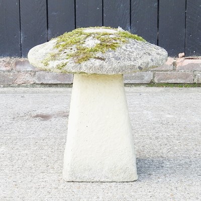 Lot 13 - A cast stone staddle stone, 50cm high