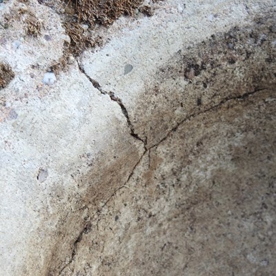 Lot 24 - A cast stone garden urn, on a pedestal base,...