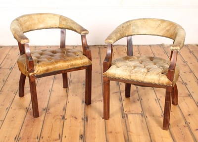 Lot 403 - A pair of green leather button-upholstered...