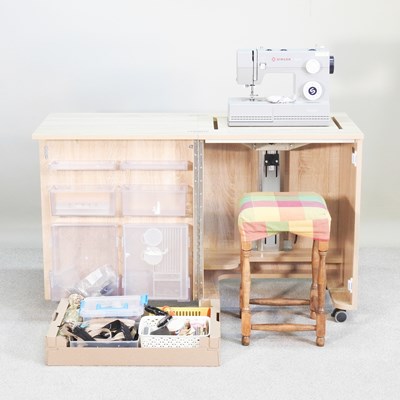 Lot 258 - A Singer heavy duty HD 6335M sewing machine,...