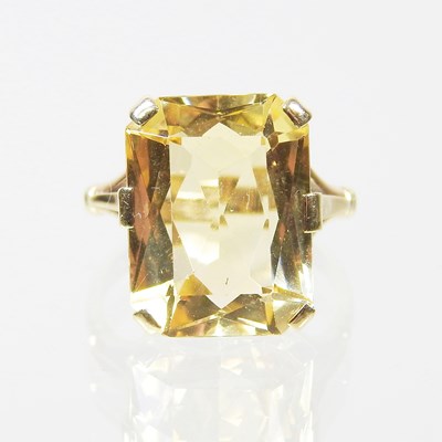 Lot 28 - A large 9 carat topaz cushion cut dress ring,...