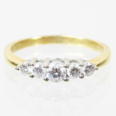Lot 141 - An 18 carat gold diamond ring, set with five...
