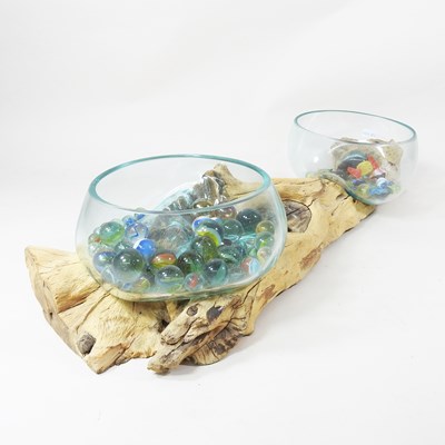 Lot 555 - An Eastern melted glass bowl, on a rootwood...