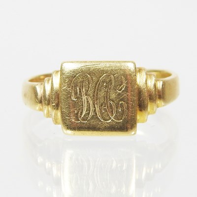 Lot 5 - An 18 carat gold signet ring, engraved with a...