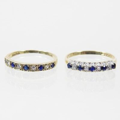 Lot 168 - A 9 carat gold sapphire and diamond half hoop...