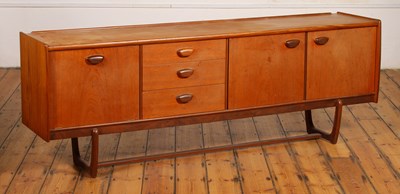 Lot 192 - A mid-century teak long sideboard