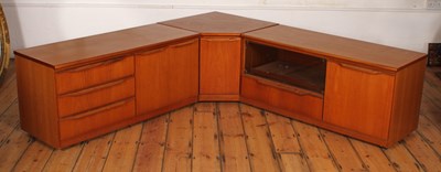 Lot 433 - A mid-century teak modular sideboard
