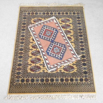 Lot 419 - A bokhara rug, with rows of medallions, on...