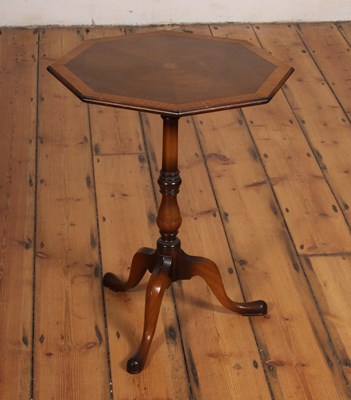 Lot 608 - A radially veneered mahogany tripod occasional...