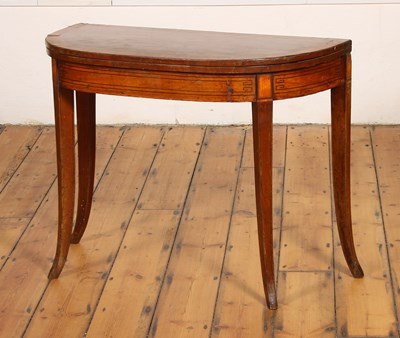 Lot 413 - A Regency mahogany and ebony strung folding...