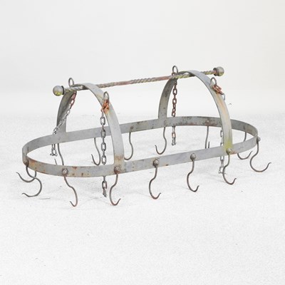 Lot 140 - A metal kitchen pan rack, suspended with hooks