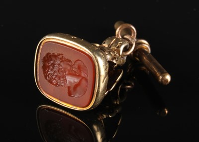 Lot 83 - A yellow metal fob seal, the hardstone seal...
