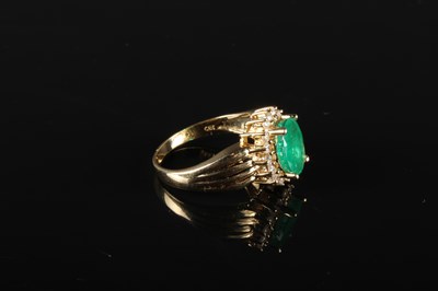 Lot 51 - A 14 carat emerald and diamond cluster ring,...