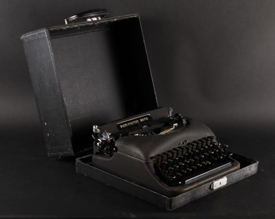 Lot 689 - A vintage Remington Rand typewriter, cased