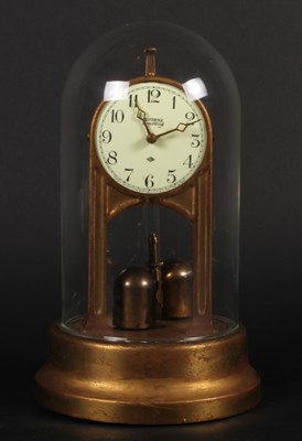 Lot 179 - A Tiffany Neverwind brass 4.5 volt mantel...