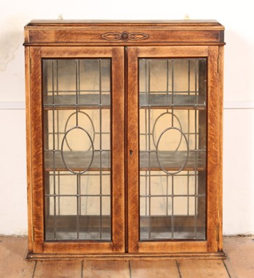 Lot 661 - A 1920s oak wall mounted cupboard, 87 x 73 x 22cm