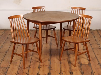 Lot 477 - A set of four Ercol style stick back dining...
