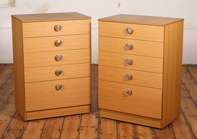 Lot 557 - A pair of chests of five drawers, each having...