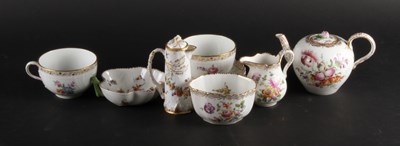 Lot 398 - A matched continental floral porcelain part...