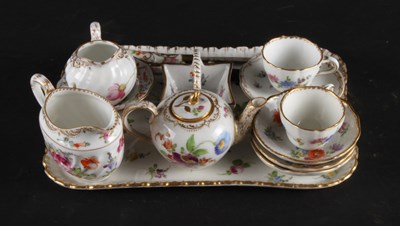 Lot 355 - A matched Dresden floral miniature tete a tete...