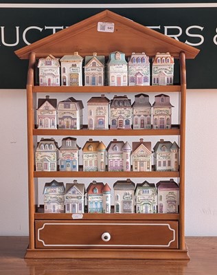 Lot 643 - A Brooks & Bentley 24 piece porcelain spice...