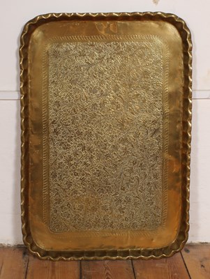 Lot 709 - A large Indian brass tray