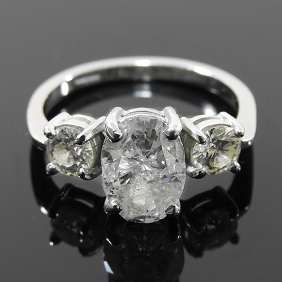 Lot 32 - An impressive platinum and diamond three stone...