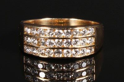 Lot 66 - A18 carat yellow gold diamond three row...