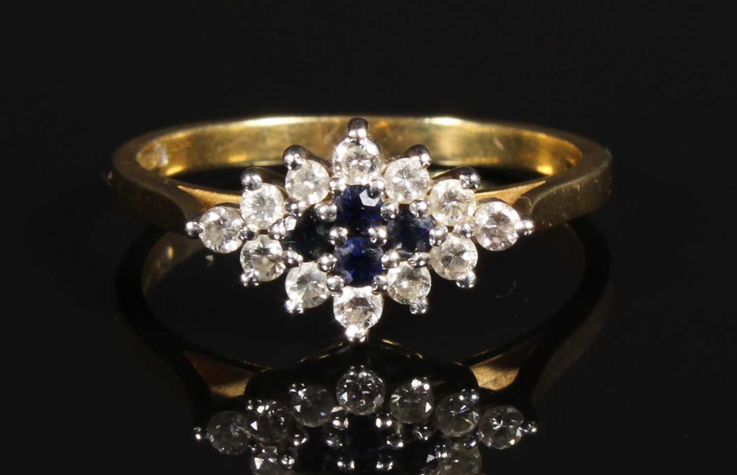 Lot 105 - An 18 carat yellow gold sapphire and diamond...