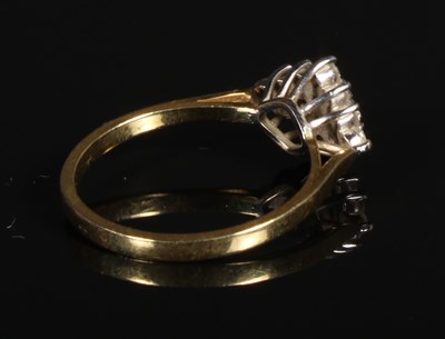 Lot 105 - An 18 carat yellow gold sapphire and diamond...