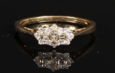 Lot 158 - A 9 carat yellow gold diamond cluster ring,...
