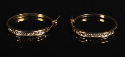 Lot 157 - A pair of 10 carat yellow gold diamond hoop...