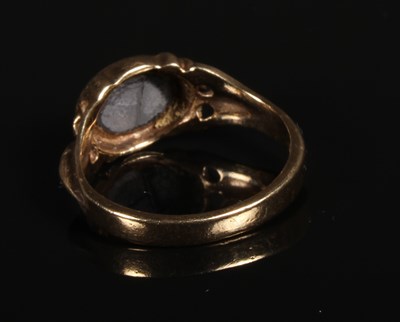 Lot 64 - A 9 carat yellow gold opal ring, size K/L, 2.4g