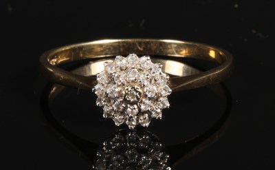 Lot 38 - A 9 carat diamond cluster ring, size W, 1.8g