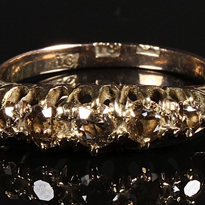 Lot 170 - An 18 carat gold five stone yellow diamond...