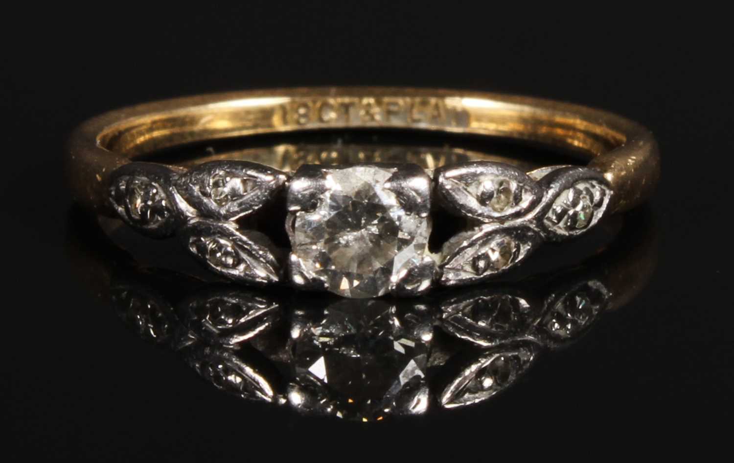 Lot 106 - An 18 carat yellow gold and platinum diamond...