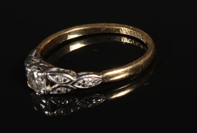 Lot 106 - An 18 carat yellow gold and platinum diamond...