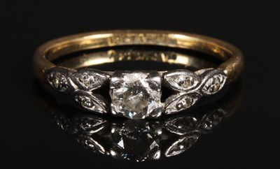 Lot 106 - An 18 carat yellow gold and platinum diamond...