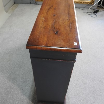 Lot 42 - A hand made oak and painted wine rack, to hold...