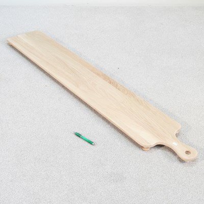 Lot 573 - A large hand made oak meze platter, 150cm long