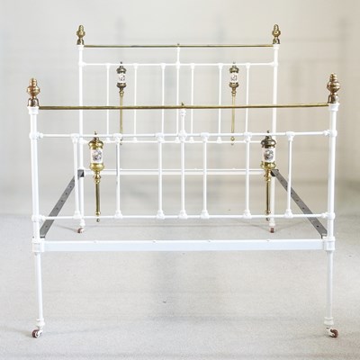 Lot 396 - A Victorian white painted iron and brass...