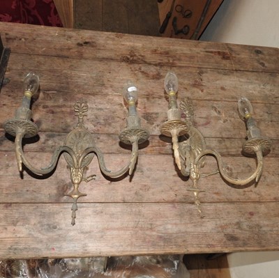 Lot 290 - A pair of twin branch brass wall lights