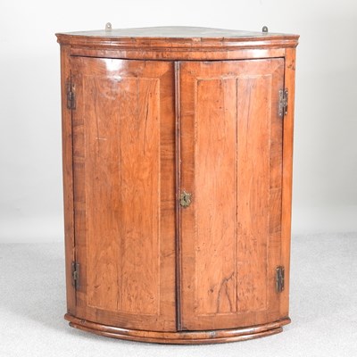 Lot 501 - A George III oak and mahogany crossbanded bow...