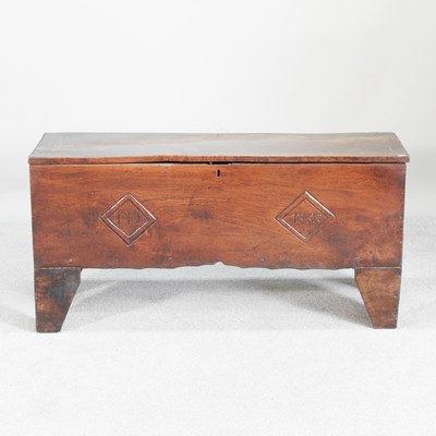 Lot 221 - An 18th century oak six plank coffer,...