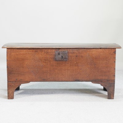 Lot 266 - An 18th century oak six plank coffer, with...