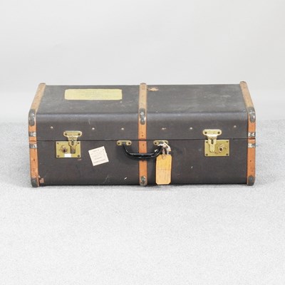 Lot 480 - A vintage wooden bound trunk